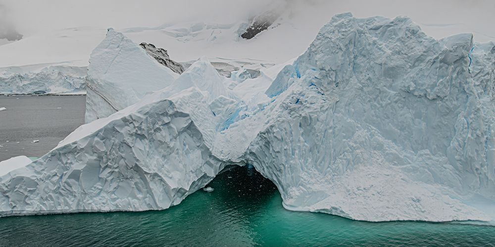 Iceberg with Dark Cave Opening art print by Richard Silver for $57.95 CAD