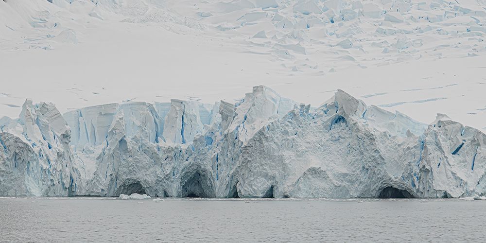 Jagged Glacier Wall with Caves art print by Richard Silver for $57.95 CAD
