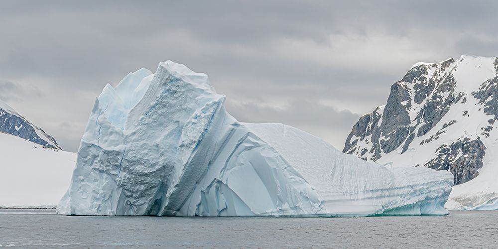 Pyramid Iceberg with Mountains art print by Richard Silver for $57.95 CAD