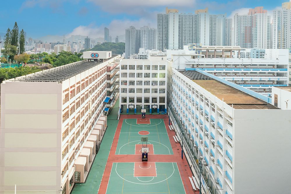 Hong Kong Basketball Court Between Housing Blocks art print by Richard Silver for $57.95 CAD