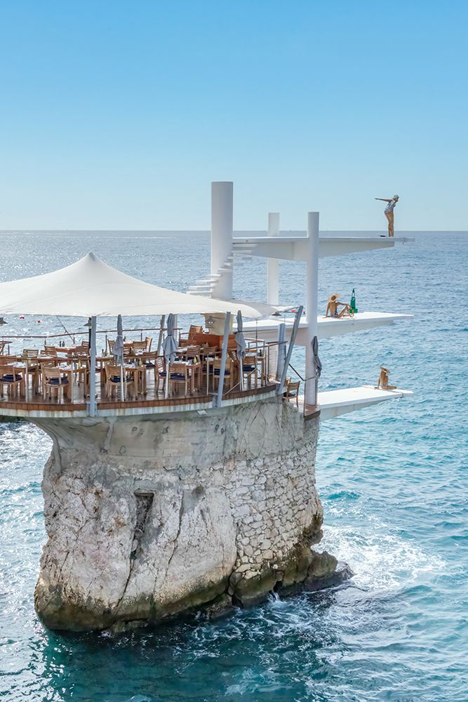French Riviera Cliffside Rock Platform Restaurant art print by Richard Silver for $57.95 CAD