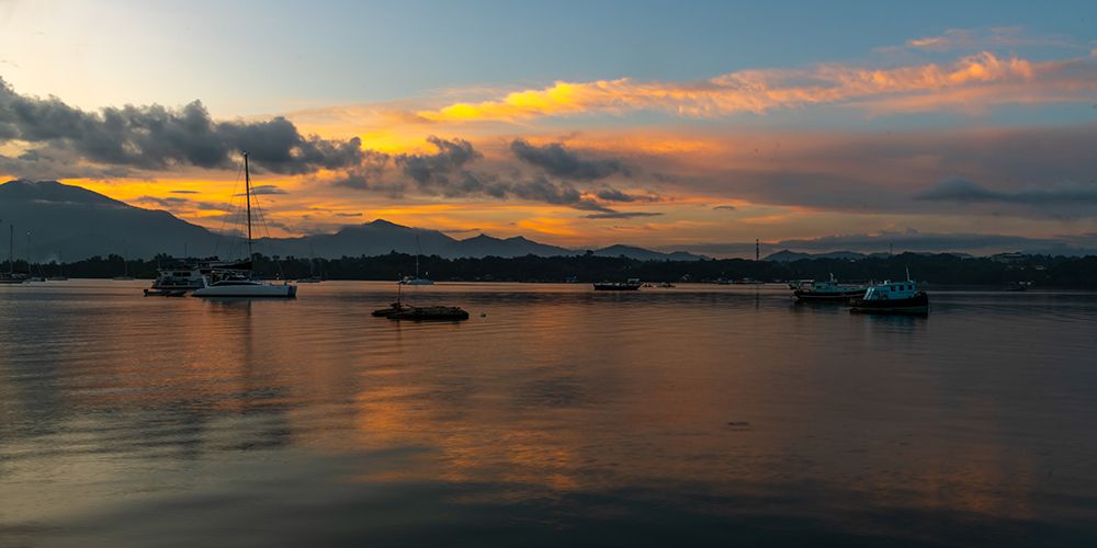 Harbor at Dusk with Mountain Backdrop, Philippines art print by Richard Silver for $57.95 CAD