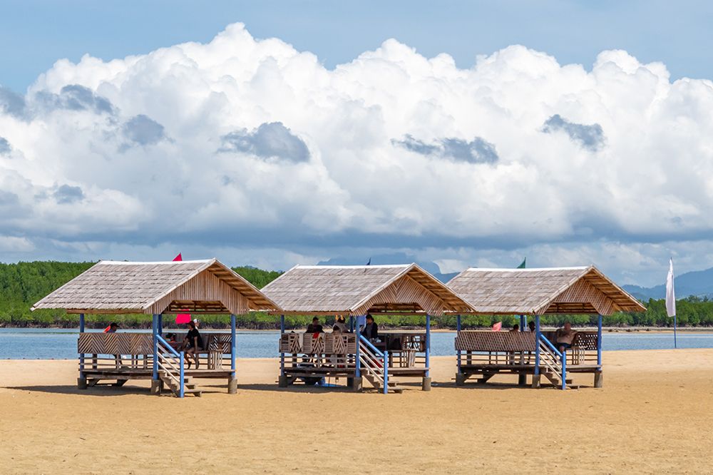 Thatched Beach Cabanas on Sandy Shore, Philippines art print by Richard Silver for $57.95 CAD