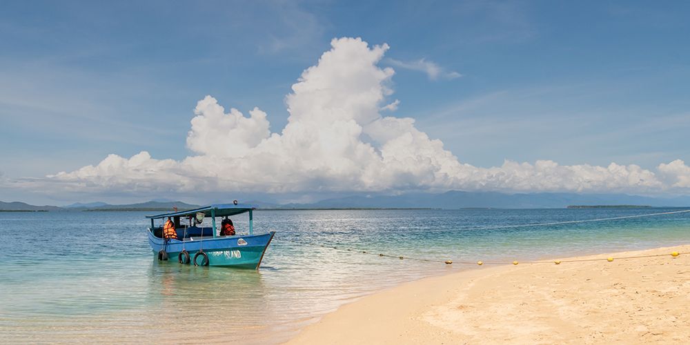 Small Boat with Passengers in Turquoise Water, Philippines art print by Richard Silver for $57.95 CAD