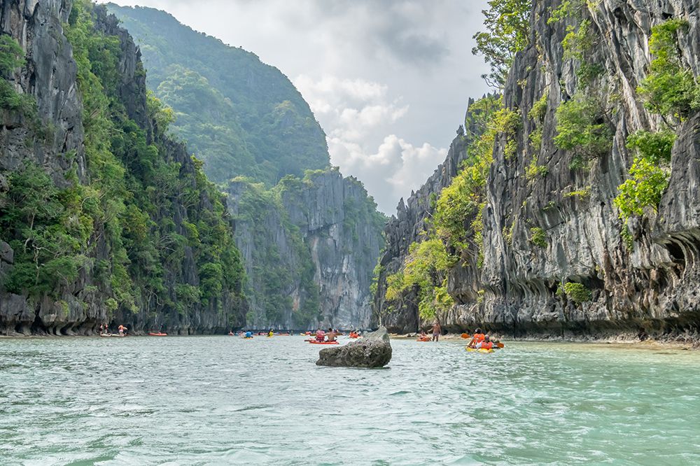 Kayaks Entering Hidden Lagoon, El Nido, Palawan, Philippines art print by Richard Silver for $57.95 CAD