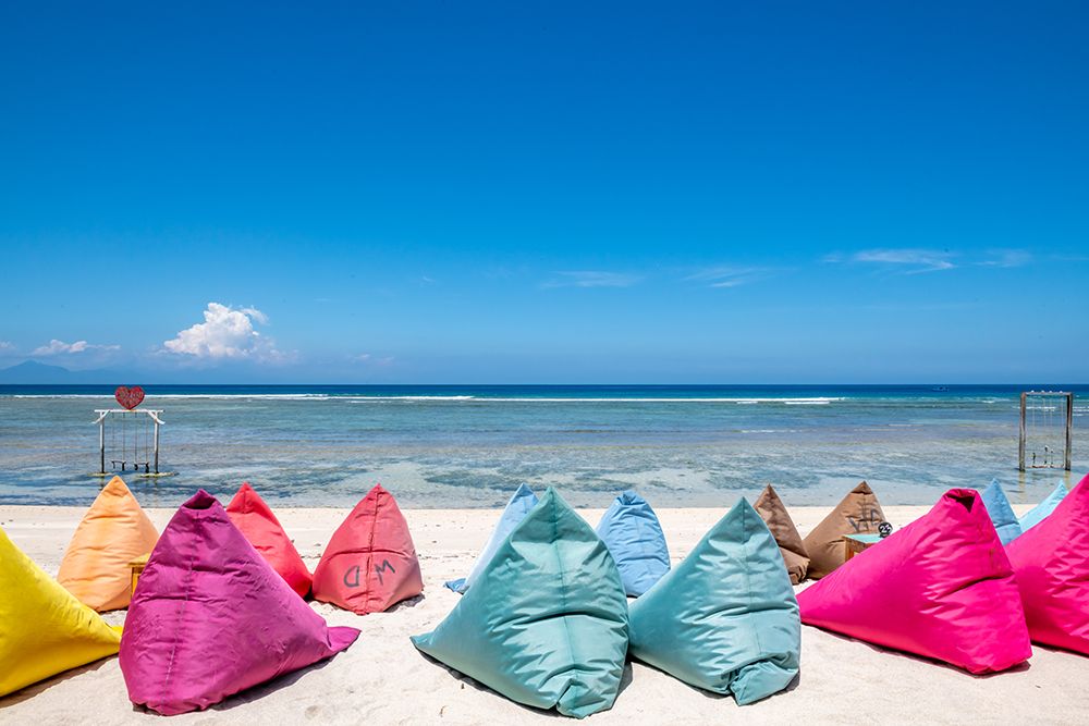 Row of Colorful Beach Bean Bags, Gili Islands, Indonesia art print by Richard Silver for $57.95 CAD