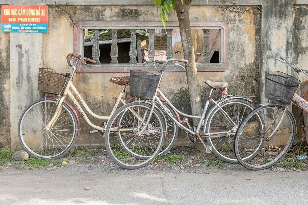 Vintage Bicycles Against Weathered Wall, Vietnam art print by Richard Silver for $57.95 CAD