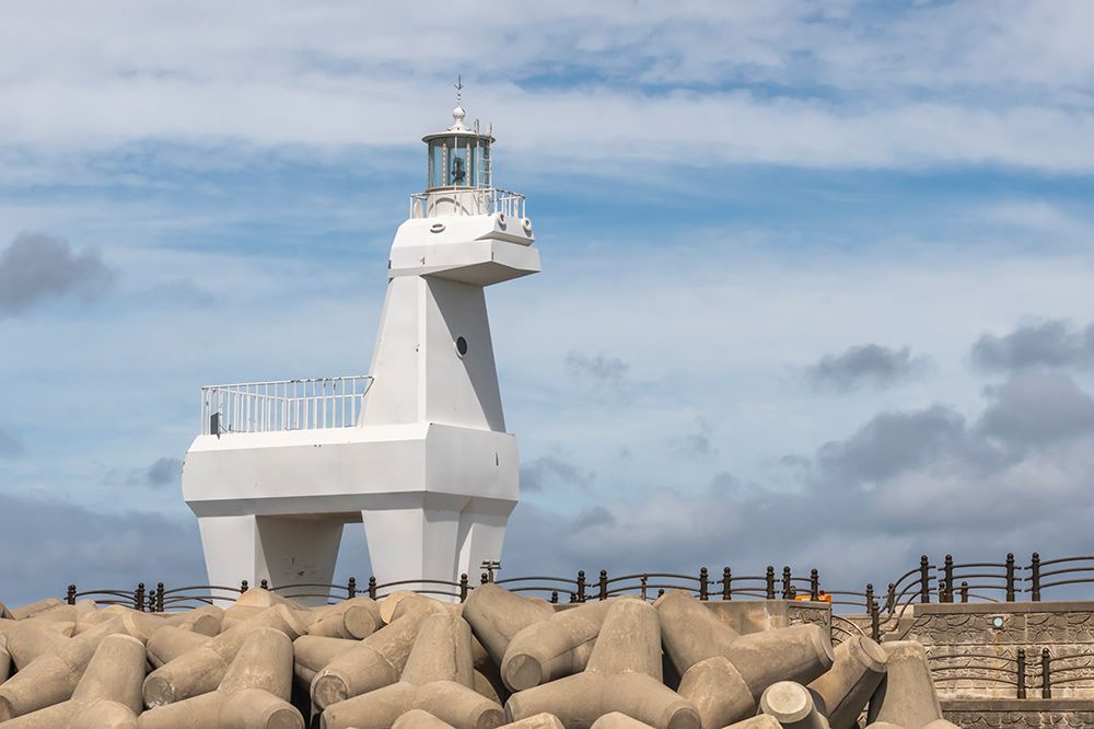 White Horse-Shaped Lighthouse on Rocky Jetty, Jeju Island, South Korea art print by Richard Silver for $57.95 CAD