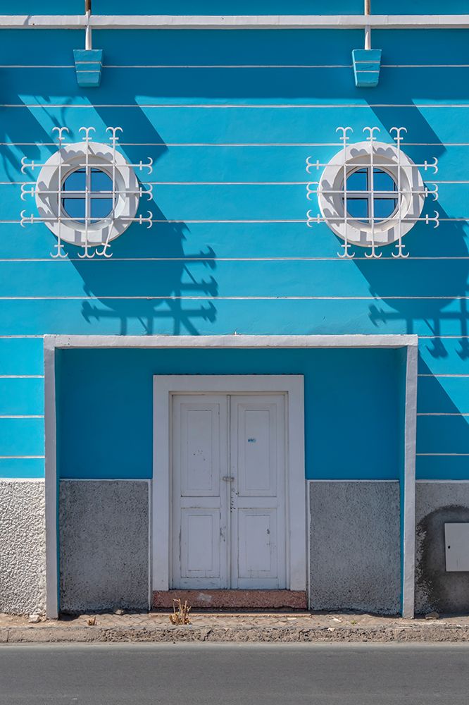 Blue Building Facade with Round Porthole Windows art print by Richard Silver for $57.95 CAD