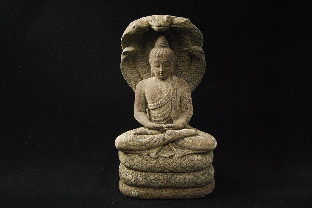 Buddha Statue Seated on Cobra art print by Artographie for $57.95 CAD