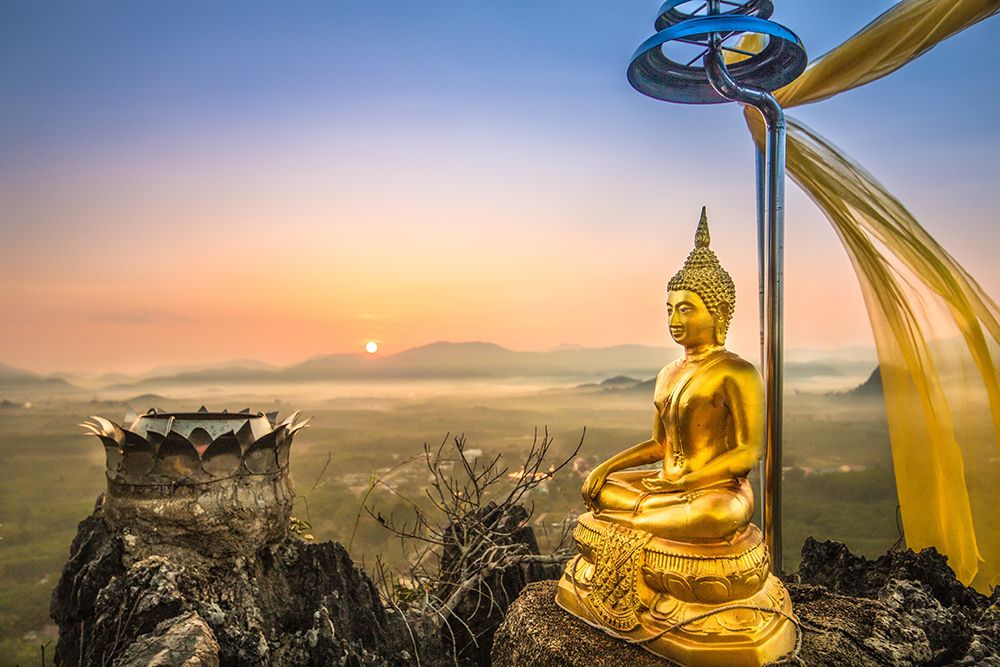 Golden Seated Buddha Statue art print by Artographie for $57.95 CAD