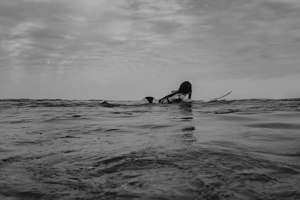 Woman Surfing art print by Artographie for $57.95 CAD
