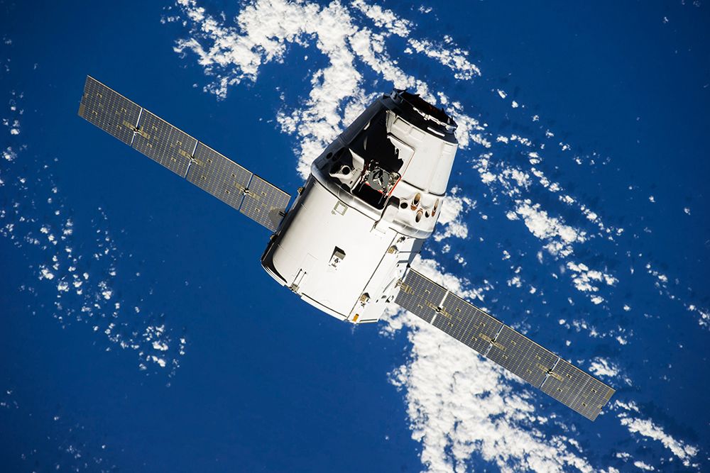 Space X-4 Dragon Commercial Cargo Approaches the ISS - 2014 art print by NASA for $57.95 CAD