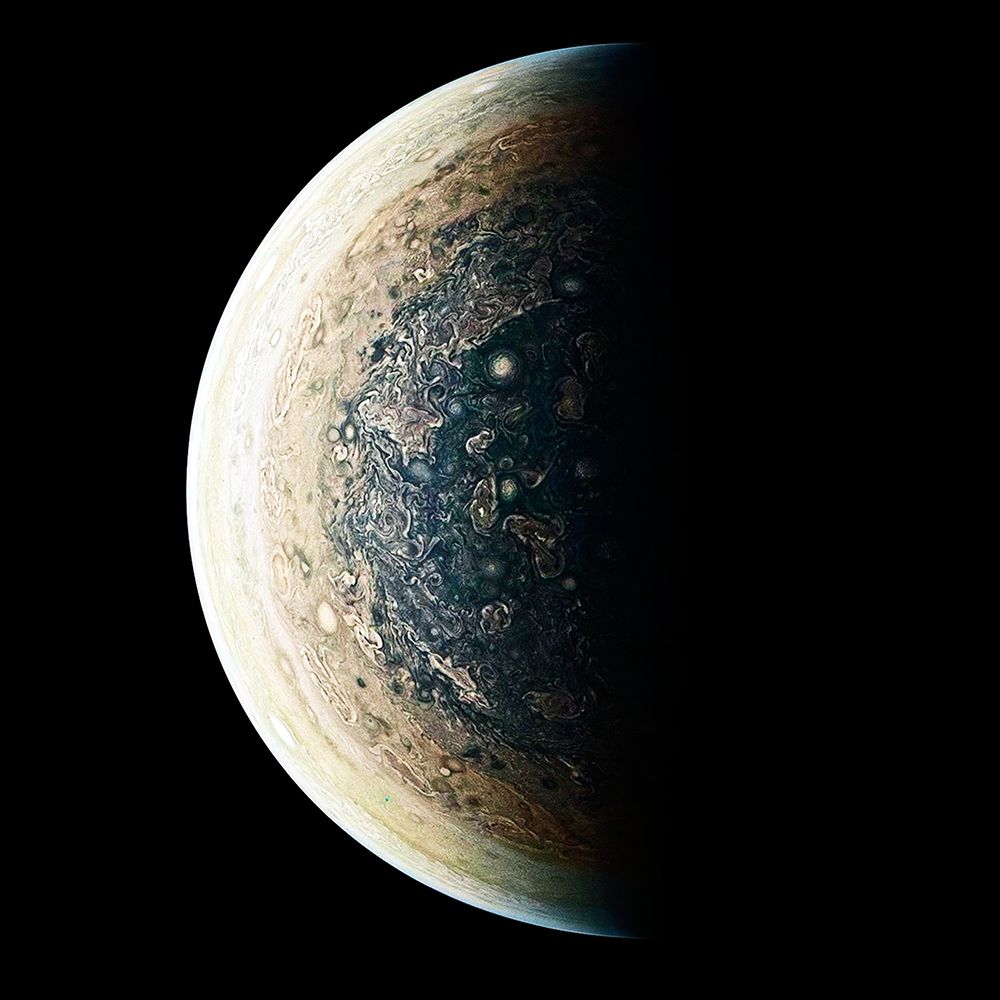 This enhanced-color image is of Jupiters South Pole and its Swirling Atmosphere art print by NASA for $57.95 CAD